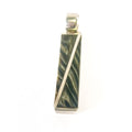 Marbled green and gold pendant on a white background
