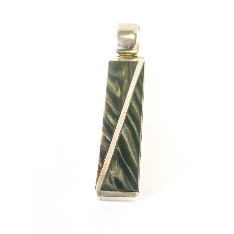 Marbled green and gold pendant on a white background